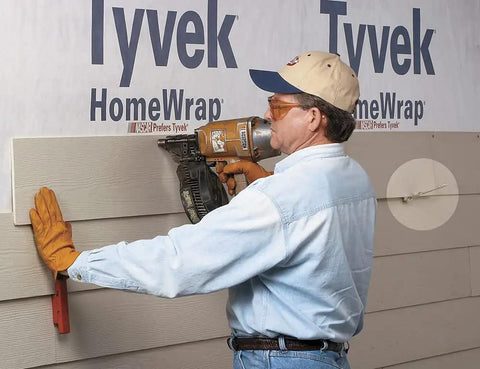 Person using a 5 To 8 Inch Exposure Facing And Overlap Gauge Set For One Person Siding Installations with power tool