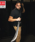 Naginata Japanese Polearm Sword With Sheath Satin Finished 18 Inch 7Cr13 Stainless Steel Blade in use by a martial artist