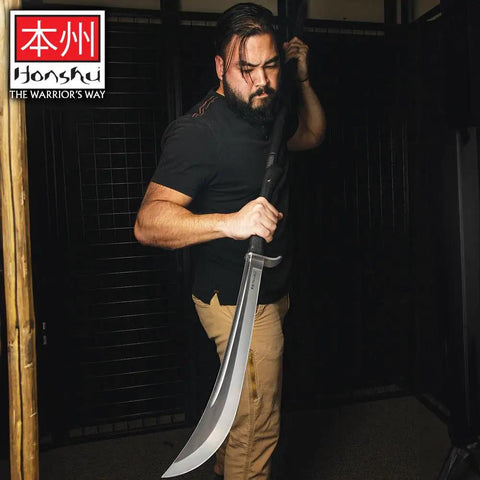 Naginata Japanese Polearm Sword With Sheath Satin Finished 18 Inch 7Cr13 Stainless Steel Blade in use by a martial artist
