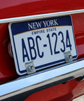 Four Piece Badass U Nut Fastener Clips For Car License Plates And Bumpers Built Tough For Any Ride Quick Install Rust Resistant Steel Hardware Lock It Down Tight securing a New York license plate.