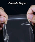 Hands holding 300 Pack 3x4 Inch Clear Zip Bags Reclosable Small Plastic Pouches For Beads Pills Screws Jewelry Packaging