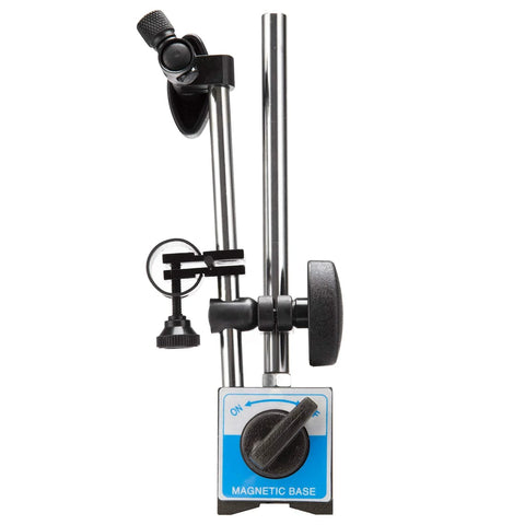 Front view of dial indicator with magnetic base holder; chrome arms, black knobs, blue base label.