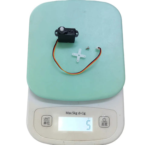 Ultra Micro 4.3g Digital Servo PS1319 Replacement For VOLANTEX RC Aircraft on scale showing 5g with wires and screws