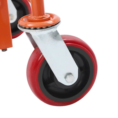 Close-up of a red and black steel caster wheel from the Rock Solid Furniture Moving Kit With 1300 Lb Rating Steel Slider Pads That Roll Smooth On Hardwood Floors While Loading Couches And Fridges No Sweat For Weekend Movers.