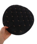 Kickass Black Plush Motorcycle Seat Cover With Dope QuickGrip Straps For Dirt Bikes And Mopeds Providing Cozy Winter Warmth Secure Mounting And Heavy Duty Protection in hand.