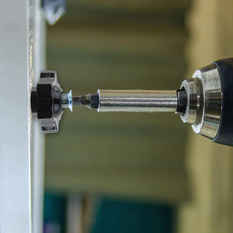 M6 Star Knob Through Hole Thumbwheel Panel Mount Clamping Handle 10 Pack Black Plastic with assembly tool in action.