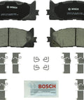 Bosch BC1293 front ceramic brake pads pair with hardware clips and lubricant packet