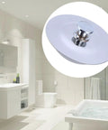 Close-up of Stainless Steel Bathtub Stopper for 40-45mm Drain Holes in a modern bathroom setting.