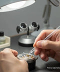 Watchmaker using Pro Grade Watch Movement Installation Rod And Cleaning Stick Kit For precise dial repair and maintenance work.
