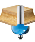Top Shelf 3/4 Inch Radius Cove Router Bit With 7/8 Inch Height And Half Inch Shank shown against a crafted wooden edge.