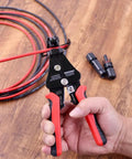 All In One 3 In 1 Adjustable Wire Stripper Tool with Automatic Solar Cable Stripper held by hand next to cables