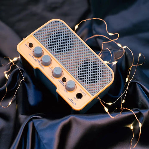 Tiny But Mighty 5W Mini Guitar Amp With Bluetooth 5.0, Clean And Overdrive Channels, Rechargeable Battery, Blue Edition on fabric