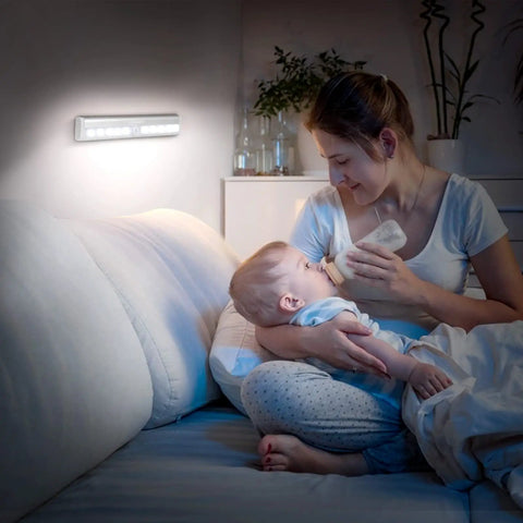 Battery Operated Motion Sensor Light For Indoor Use, Magnetic Under Cabinet Strip, Wireless Stick On Closet Night Light, Cool White Two Pack, Auto On With Movement illuminates mother in bedroom at night