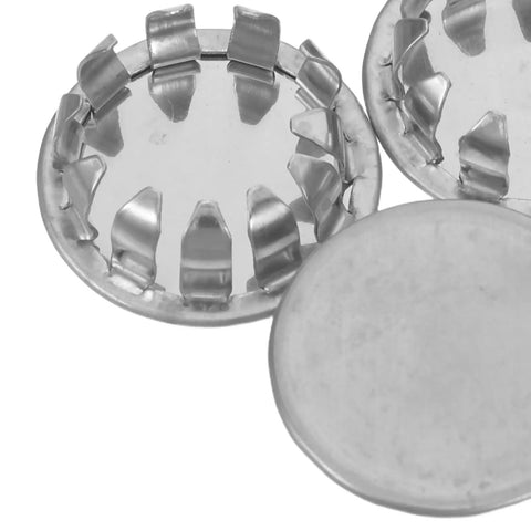 10 Pack Round Stainless Steel Knockout Plugs For Junction Boxes And Electrical Panels showing metal seals with a snap fit design.