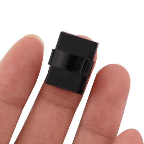 Self Adhesive Cable Clips With 3M Adhesive For Tidy Cables Wire Holder Clamp on a fingertip, black, compact size, fits 0 to 5 mm cables.