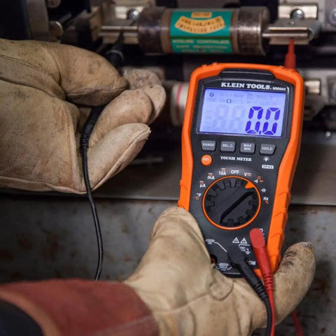 Person using multimeter with Replacement Test Lead Set, Right Angle Probes, Universal Banana Inputs, for electrical testing