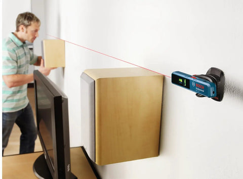 Line And Point Laser Level With 65 Ft Range, Two Bubble Vials, Batteries Included, And Versatile Mount For Easy Setup used on wall