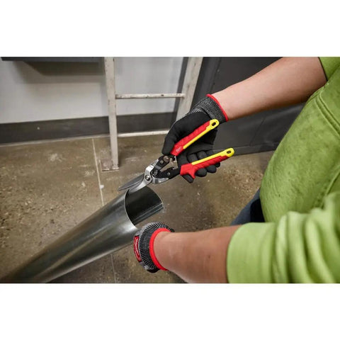 Heavy Duty Long Cut Aviation Snips With Rock Solid Chrome Blades Bolt Lock Tech And Comfy Cushion Grips For Smooth Shear Cuttin No Sweats Sheet Metal Work Jobsite Ready Gear Featuring Safe One Hand Lock And Bright Painted Handles cutting through a metal pipe.