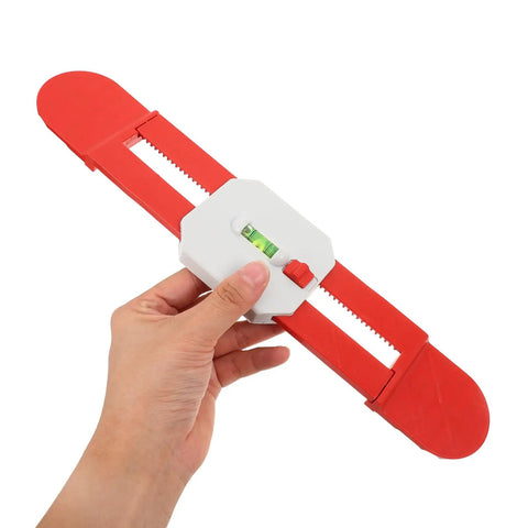 Telescopic Level Ruler Wall Mount for Split Air Conditioner Indoor Unit held in hand, red and white retractable design with bubble level.