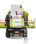 Rear view of Claas Lexion 780 Combine Harvester Toy 1 16 Scale with working grain tank, movable flaps, and figure climbing ladder.