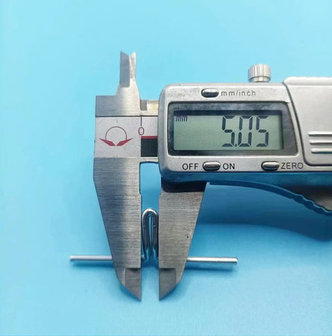 Digital caliper measuring 5mm spring clip from 30 Pack Lawn Chair Webbing Clips For Lounge Chairs And Macrame Chair Frames