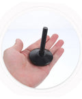 Premium Set Of Four Furniture Levelers Featuring Swivel Foot Screws for height adjustment held in a hand, showcasing durable black rubber base.