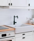 Top Shelf Matte Black Cabinet Knobs And Drawer Pulls 30 Pack Stainless Steel Single Hole T Bar Hardware For Kitchen Bathroom Cupboards 2 Inch on white cabinets.