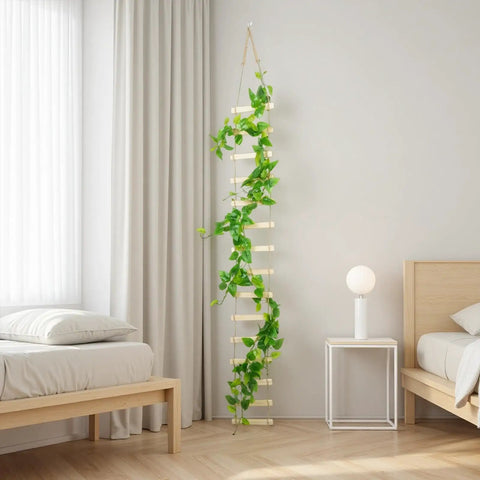 Extra Tall Six Foot Wooden Ladder Plant Trellis for indoor use supporting climbing vines in modern bedroom setting