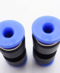Top view of two blue and black Push To Connect Fitting One Eighth Inch Tubing For Pneumatic Air And Water Applications Straight Union Two Way Connector Easy Snap On Quick Connect Coupler Space Saving Pack Of Five.