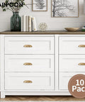 10 Pack Bin Cup Pulls Vintage Shell Handle Cabinet Hardware in Champagne Gold on white dresser