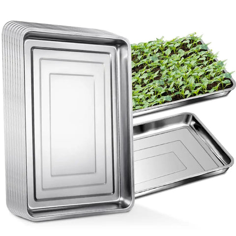 10 Pack Big Stainless Steel Seedling Trays for Nursery Pots and Seed Germination, stacked and in use with seedlings, 17.5x13.56 inches
