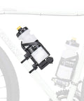 Versa Bike Mount Kit For Bottle Cages And Accessories, 2-Piece Set, Black, on white bike frame with mounted bottle