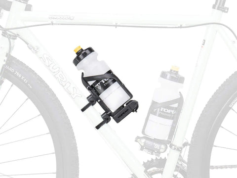 Versa Bike Mount Kit For Bottle Cages And Accessories, 2-Piece Set, Black, on white bike frame with mounted bottle