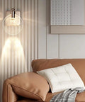 VCDUXMQLK Nordic Luxury Crystal Bedroom Wall Lamps LED Light Source three-color dimmable sconce on wall above sofa.