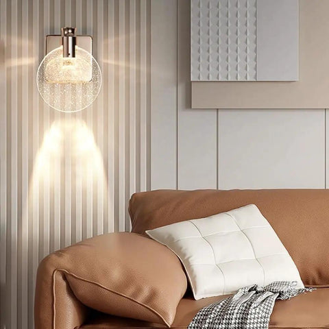 VCDUXMQLK Nordic Luxury Crystal Bedroom Wall Lamps LED Light Source three-color dimmable sconce on wall above sofa.