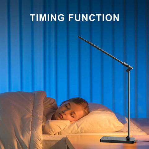 LED Desk Lamp With USB Port For Home Office And Reading, Eye Caring Light With 5 Color Modes And 5 Dimmable Levels, Touch Control And Auto Timer, Piano Style Modern Table Lamp next to a sleeping child at bedtime