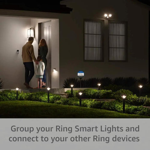 Slick Solar Pathlight Featuring Motion Activated 80 Lumen Bright Led Bulbs guiding family at nighttime into the house.
