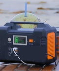 Portable AC Power Station With Fast Charging Ports, Campground Essential Backup Generator For Road Trips, Camper Vans, Drones And Storm Outages, Power Your Squad Gear Anytime No Sweat Or Fuss on wooden surface with battery indicator.