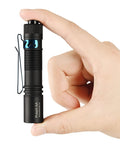 Rechargeable AA Pocket Flashlight With Clip, Tiny But Mighty EDC Light held between fingers showing size