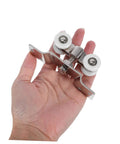 Hand holding Stainless Steel Sliding Door Track Wheels With Nylon Rollers Silent Pulley System for quiet operation