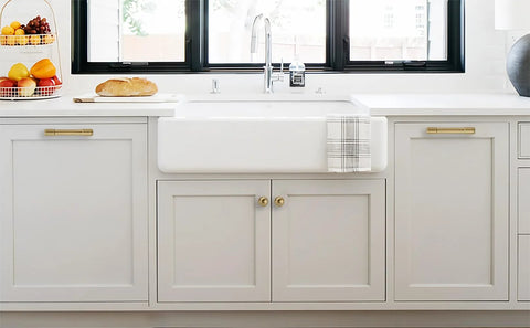 Champagne Bronze Cabinet Knobs 4 Pack, 1 Inch Single Hole Dresser Drawer Pulls For Bathroom Cabinets installed on white kitchen cabinets