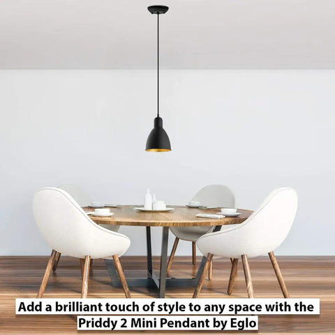 Priddy 1-Light Mini Pendant With Steel Shade Black And Gold For Kitchen Island Hallway And Dining Room hanging over a modern dining table
