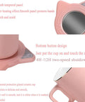 Keep Your Daily Grind Toasty With This Rapid Heating Desk Coffee Warmer Featuring Smart Temperature Controls Dual Timer Auto Shutoff And An Anti Slip Plate For Zero Mess Sipping, showing pink ceramic mug heater with smooth panel.