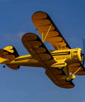 UMX Waco Yellow RC Airplane Bind-N-Fly BNF With AS3X And Safe Technology, Easy To Fly Micro Warbird For Beginners in flight