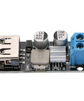 Slick And Solid Dc Dc Buck Converter Step Down Voltage Regulator Module 6V To 32V To 5V With Usb Quick Charge Port and screw terminals.