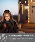 Woman using smartphone to control Heavy Duty Outdoor Wi-Fi Smart Plug With Dual Sockets, Rock Solid Weather Resistant Power Strip.