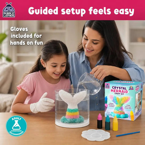 Mermaid Crystal Growing Kit For Kids 6 To 8, STEM Craft Toy That Grows Sparkling Crystals On A Mermaid Tail, Totally Screen-Free, Hands-On Science And Art Project For Young Scientists. Girl and adult pouring water into mermaid tail crystal kit