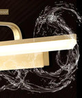 Lit Vanity Light With Brushed Brass Arc Arm Sconces Long Acrylic Linear Wall Light In Gold shown in a waterproof design