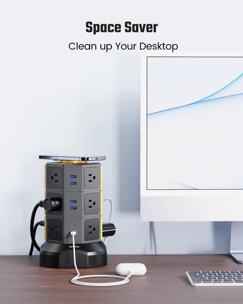 All In One Power Strip Tower With 15W Magnetic Wireless Charger And 1050J Surge Protector on desk next to computer monitor