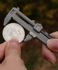 Pocket Vernier Caliper Ruler 0 To 50mm For Precise Outer Inner Diameter Measurements shown measuring a coin